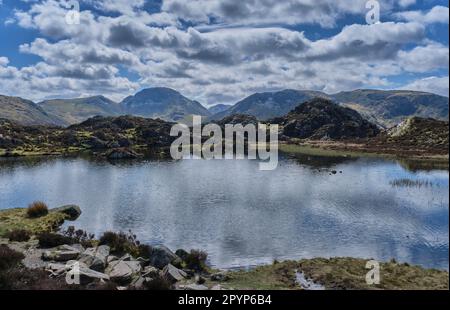 Innominate Tarn, guardando verso Great Gable, da Hay Stacks vicino Buttermere, Lake District, Cumbria Foto Stock