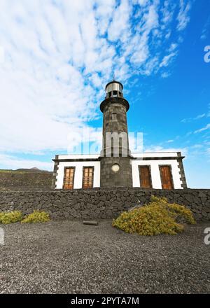 Paesaggio con faro Faro de Fuencaliente, Salinas de Fuencaliente, isola la Palma, isole Canarie, Spagna Foto Stock