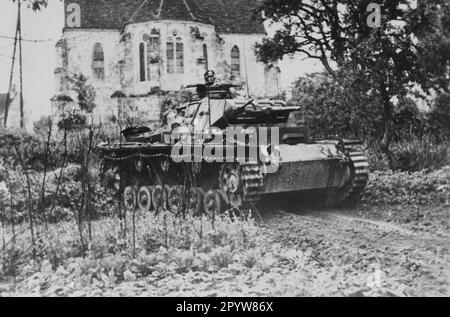 Panzer III in combattimento durante la campagna francese. Foto: Tritschler. [traduzione automatica] Foto Stock