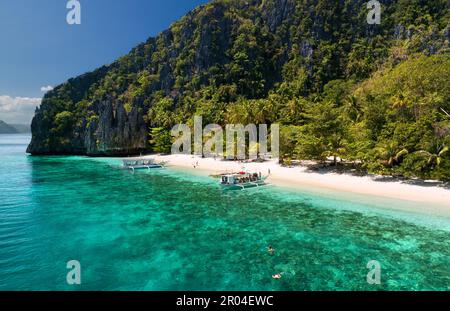 La spiaggia di Entalula si trova sull'isola di Entalula, vicino a El Nido, Palawan, Philippines. Foto Stock