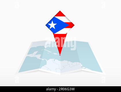 Puerto Rico è raffigurato su una mappa su carta piegata e segnaposto con bandiera di Puerto Rico. Mappa vettoriale piegata. Illustrazione Vettoriale