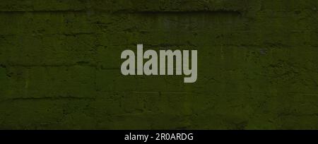 vecchio muro di cemento mossy bacground Foto Stock