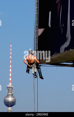 Scalatore industriale, torre televisiva, berlino, germania Foto Stock