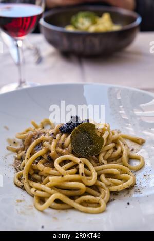 Un piatto di bigoli, un tipo veneziano di pasta fresca Foto Stock