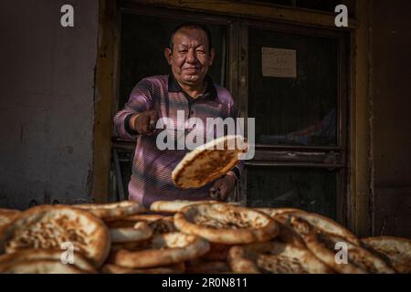 Baker a Kashgar, Cina; Asia Foto Stock