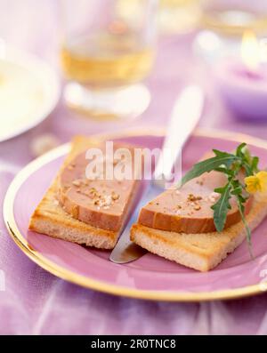 Il Foie gras su pane tostato Foto Stock