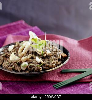 Calamari risotto di inchiostro Foto Stock