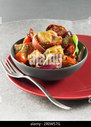 Filetto di maiale e stufato di pistou Foto Stock