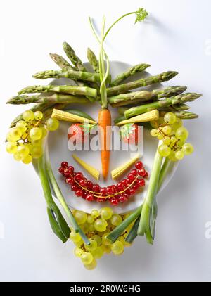 Frutta e verdura in forma di una faccia Foto Stock