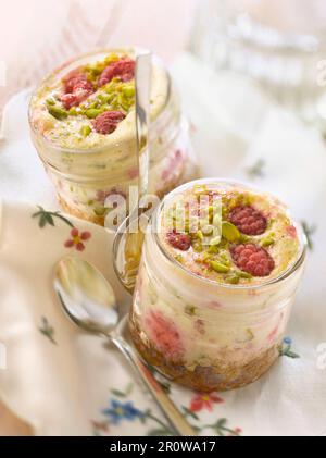 Cheesecake al lampone e al pistacchio Foto Stock