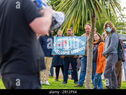 La comunità di Falmouth ha una protesta di emergenza in solidarietà con i rifugiati mentre il controverso Bibby Stockhold arriva a Port Foto Stock