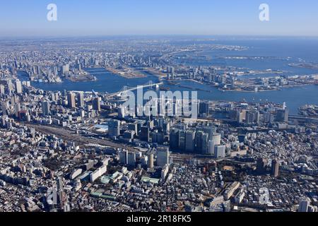 Shinagawa Station aerial shot from the West side towards Odaiba and Rainbow Bridge direction Stock Photo