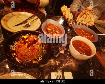 Cibo indiano in un ristorante a Madrid Foto Stock