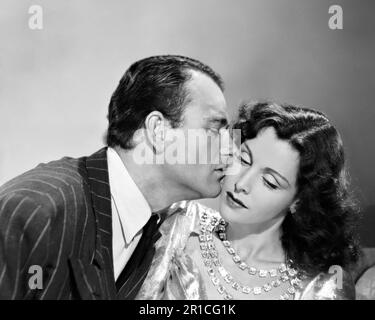 JOHN WAYNE e FRANCES DEE in Un UOMO TRADITO (1941), diretto da JOHN H. AUER. Credit: FOTO REPUBBLICA / Album Foto Stock