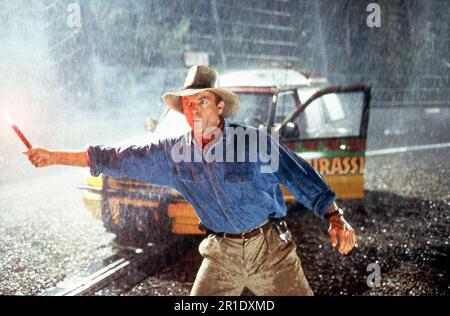 SAM NEILL in JURASSIC PARK 1993 regista STEVEN SPIELBERG romanzo Michael Crichton sceneggiatura Michael Crichton e David Koepp musica John Williams Amblin Entertainment / Universal Pictures Foto Stock