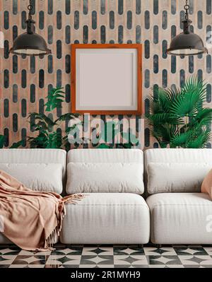 Cornice foto vuota mockup appeso su sfondo decorativo parete motivo. Piante dietro divano. Arte, Poster Display. Interni moderni. Foto Stock