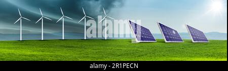 Turbine eoliche e celle solari su un campo verde in un paesaggio collinare Foto Stock