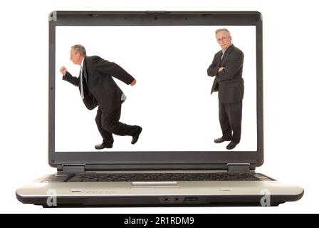 Computer portatile con un uomo d'affari sul monitor isolato Foto Stock