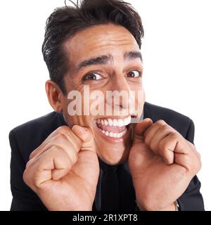 Entusiasta della sua nuova offerta commerciale. Primo piano di un uomo d'affari eccitato e pazzo guardando contro uno sfondo bianco. Foto Stock
