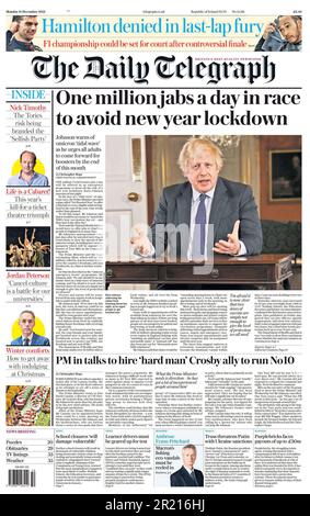 Daily Telegraph front page, 13th dicembre 2021, il primo ministro esorta i vaccinatori a combattere un aumento nella variante di Omicron come parte della campagna di vaccinazione di richiamo di Covid-19 Foto Stock