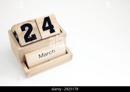 Calendario perpetuo in legno che mostra il 24th marzo Foto Stock