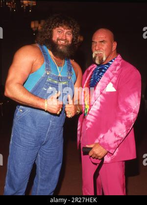 **FILE PHOTO** la superstar Billy Graham è scomparsa. Hillbilly Jim e la superstar Billy Graham credito di $1989: Ralph Dominguez/MediaPunch Foto Stock