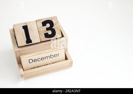 Calendario perpetuo in legno che mostra il 13th dicembre Foto Stock