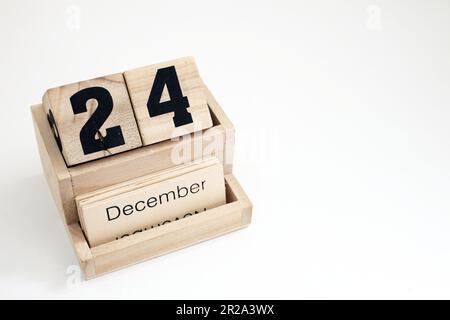 Calendario perpetuo in legno che mostra il 24th dicembre Foto Stock