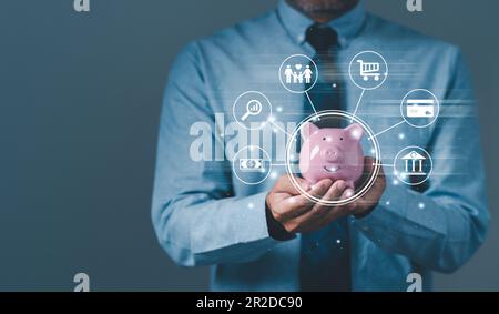 uomo d'affari o uomo che tiene piggybank. concetto di risparmio, finanza, denaro, banca, investimento. businessperson ha pianificare i soldi per il futuro di budg Foto Stock