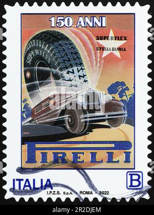 Poster vintage degli pneumatici Pirelli in francobollo Foto Stock