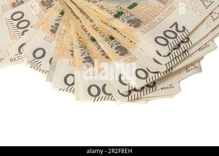 Una grande pila di banconote polacche da 200 zloty su sfondo bianco. Sinonimo di ricchezza e abbondanza. Foto Stock