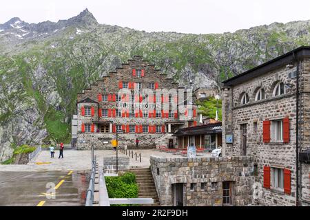 Storico Alpine Hotel Grimsel Hospiz sul Passo Grimsel, vista esterna, Guttannen, Canton Berna, Svizzera Foto Stock