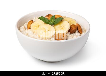 farina d'avena preparata con frutta e bacche isolate su fondo bianco Foto Stock