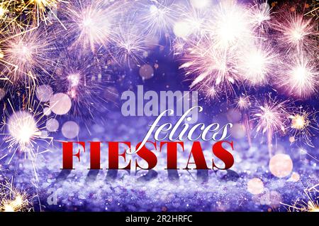 Felices Fiestas. Biglietto di auguri festivo con auguri di buon Natale in spagnolo su sfondo luminoso Foto Stock