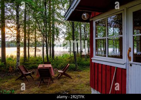 Case vacanza in legno al campeggio Sulkavan Oravanpesät, il famoso tour in canoa Squirrel Tour (Oravareitti), finlandese Lake District, Finlandia, conduce betwee Foto Stock