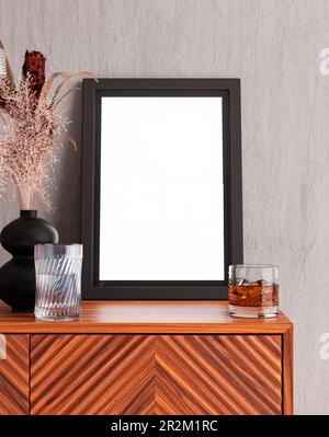 Cornice foto vuota mockup su tavolo di legno e parete bianca appoggiante sfondo Foto Stock