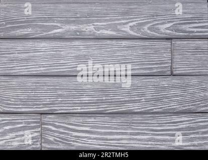 Pannelli in gres con effetto legno naturale utilizzati per pareti interne rustiche pietra artificiale decorativa che assomiglia a tavole di legno Foto Stock