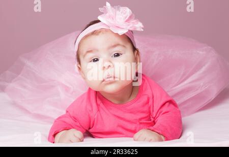 Bambino in tutu rosa Foto Stock