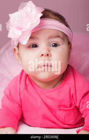 Bambino in tutu rosa Foto Stock