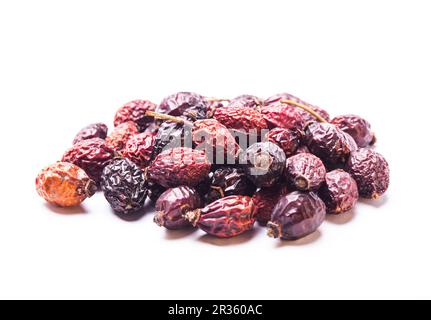 Essiccata la rosa canina bacche isolato Foto Stock