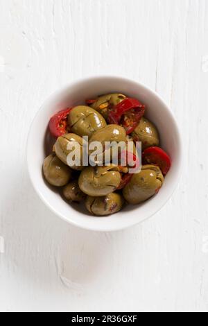 Schiacciato di olive (olive schiacciate, snocciolate e conservate, Italia) Foto Stock