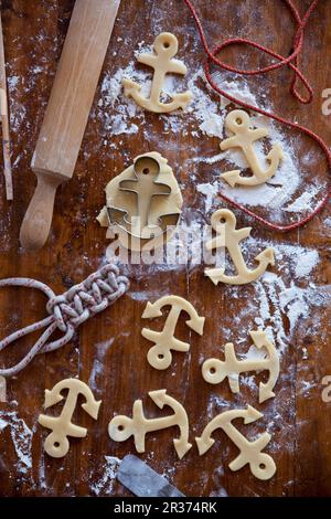 A forma di ancora lo zenzero biscotti al burro (crudi) Foto Stock