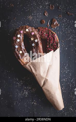 Churros fatti in casa con salsa al cioccolato fondente Foto Stock
