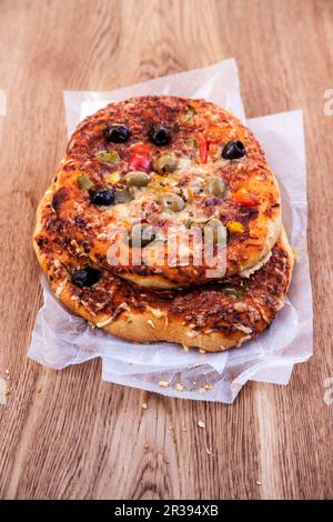 Pizze con olive Foto Stock