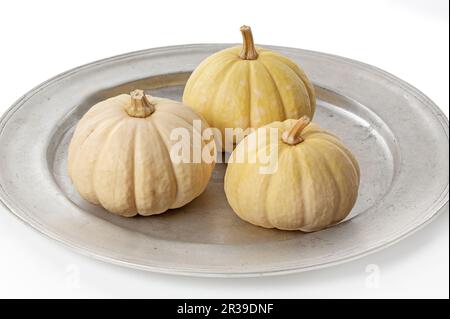Zucche ornamentali su sfondo bianco Foto Stock