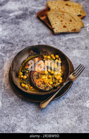 Zucca arrosto e curry di ceci con Chhonk Foto Stock