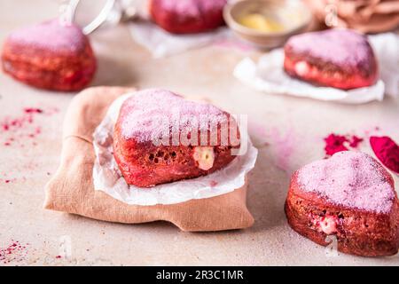 Ciambelle a cuore rosa Foto Stock