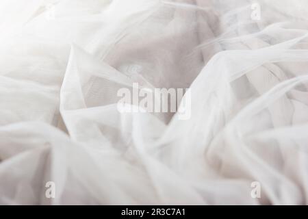 Tessuto chiffon tulle sfondo testurizzato. tessuto della gonna pieghettato. primo piano plisse tessuto textur Foto Stock