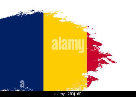 Bandiera Ciad su un pennello a tratti colorato dipinto sfondo bianco isolato con spazio copia Foto Stock