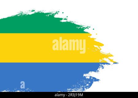 Bandiera di Gabon su un pennello a tratti colorato dipinto su sfondo bianco isolato con spazio copia Foto Stock